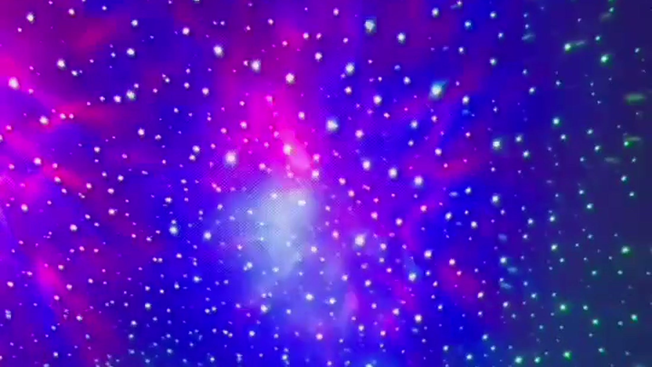 Galaxy projector nebula on a bedroom ceiling